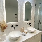 Warners Bay - Bathroom AFTER renovation - double vanity with back-lit mirrors